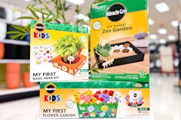 miracle grow garden kits sitting on the floor at target