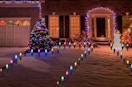 Christmas pathway lights in front of a house