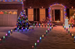 Christmas pathway lights in front of a house