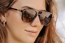 Woman wearing Retro aviator sunglasses.