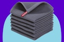 Homaxy 100% Cotton Waffle Weave Kitchen Dish Cloths on a blue background.