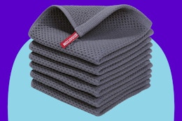 Homaxy 100% Cotton Waffle Weave Kitchen Dish Cloths on a blue background.