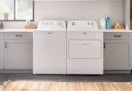 white Maytag Electric washer and dryer