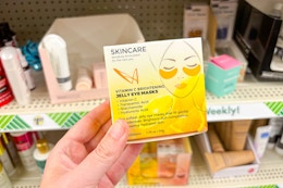 hand holding a box of vitamin c jelly eye masks at dollar tree