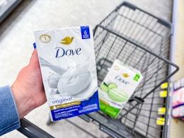 hand holding dove beauty bar packs in walgreens