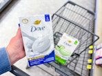 hand holding dove beauty bar packs in walgreens
