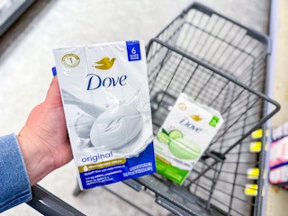 hand holding dove beauty bar packs in walgreens