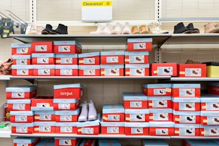 children's shoes on clearance sitting on a target shelf