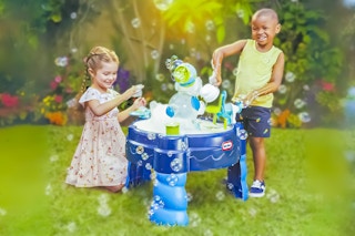 Lifestyle image of Little Tikes Water Table being used by two children outdoors