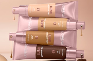 L'oreal Paris Lumi bottles stacked on top of each other