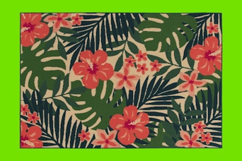 Stock image of the Mainstays 7'x10' Pink Palm Outdoor Rug