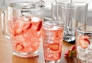 glass drinkware set with strawberries and lemonade