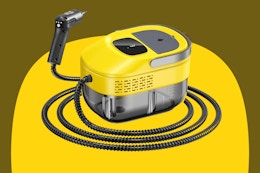 a yellow and black steam cleaner