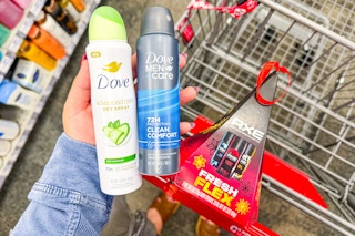 hand holdind dove deodorants