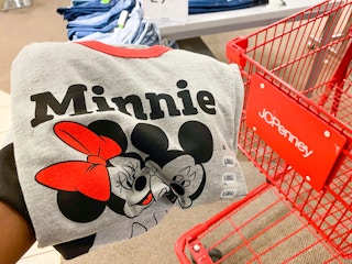 hand holding juniors' disney graphic tee