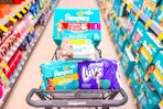 walgreens shopping cart with pampers and luvs diapers and wipes