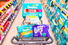 walgreens shopping cart with pampers and luvs diapers and wipes