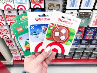 hand holding target gift cards