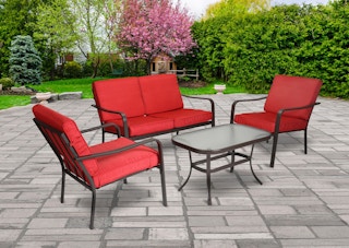 stock photo of mainstays stanton patio set with red cushions on garden patio background