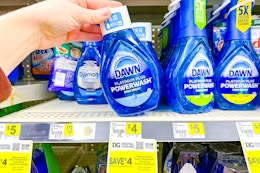 hand grabbing a bottle of dawn powerwash