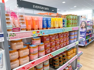 tree hut sugar scrub being held