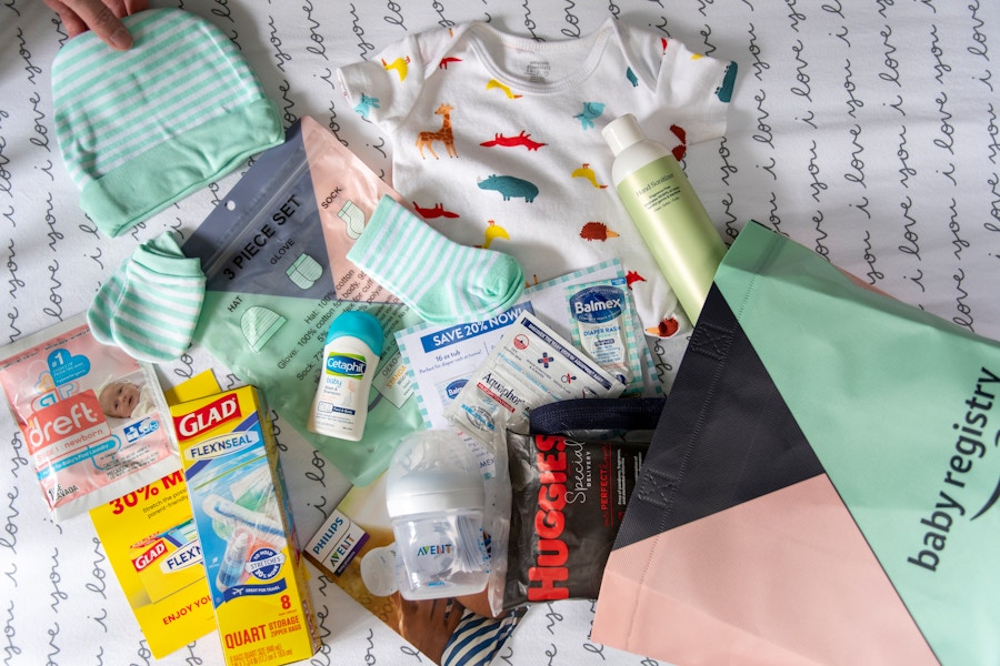 Baby products laid out with an Amazon baby registry free welcome bag.