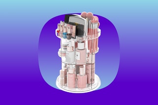 Rotating clear acrylic organizer filled with makeup