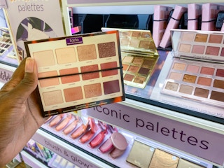someone holding a tarte tartelette pallet