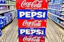 pepsi coca cola soda 12-packs in shopping cart