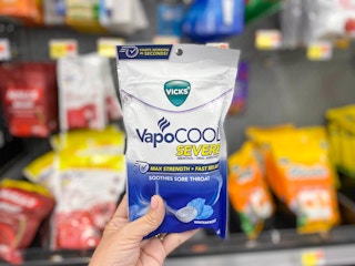 walmart vicks vapocool cough drops hand holding