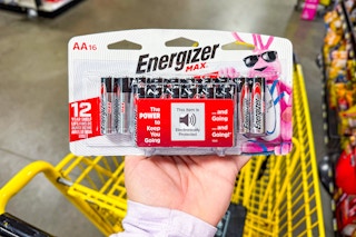 hand holding a pack of energizer batteries