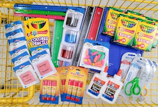 A Dollar General cart full of back to school supplies
