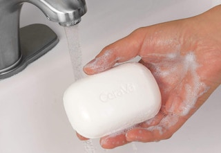 hand holding cerave bar