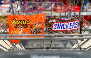 snickers and reeses fun size candy bags in a cart