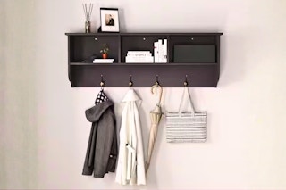 Lifestyle image of the Noble House Coat Rack mounted on the wall