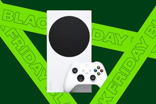 an xbox series s console in a glass case with games