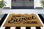front doormat with the print "home sweet home"