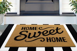front doormat with the print "home sweet home"