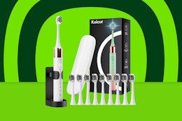 Electric Toothbrush With 10 Heads and Case, Now $9.99 on Amazon card image