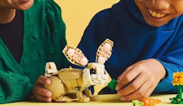 two kids building a bunny LEGO kit