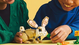 two kids building a bunny LEGO kit