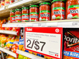 tostitos dip and salsa sitting on a target shelf with sale signage