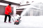 Powersmart Snow Blower: Lifestyle image of man using it outdoors