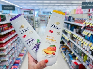 hand holding dove body wash