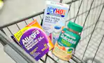 allegra, icy hot, and dulcolax in a shopping cart