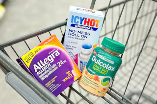 allegra, icy hot, and dulcolax in a shopping cart
