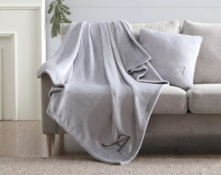kohls swift home embroidered monogram throw blanket lifestyle image 2022 1670869087 1670869087
