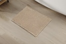 woven bat mat on floor