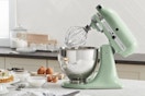 light blue tilt-head stand mixer