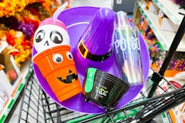 halloween party supplies in cart at dollar tree